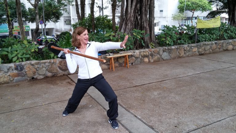 Mrs Mara is posing for her photo with the weapon.