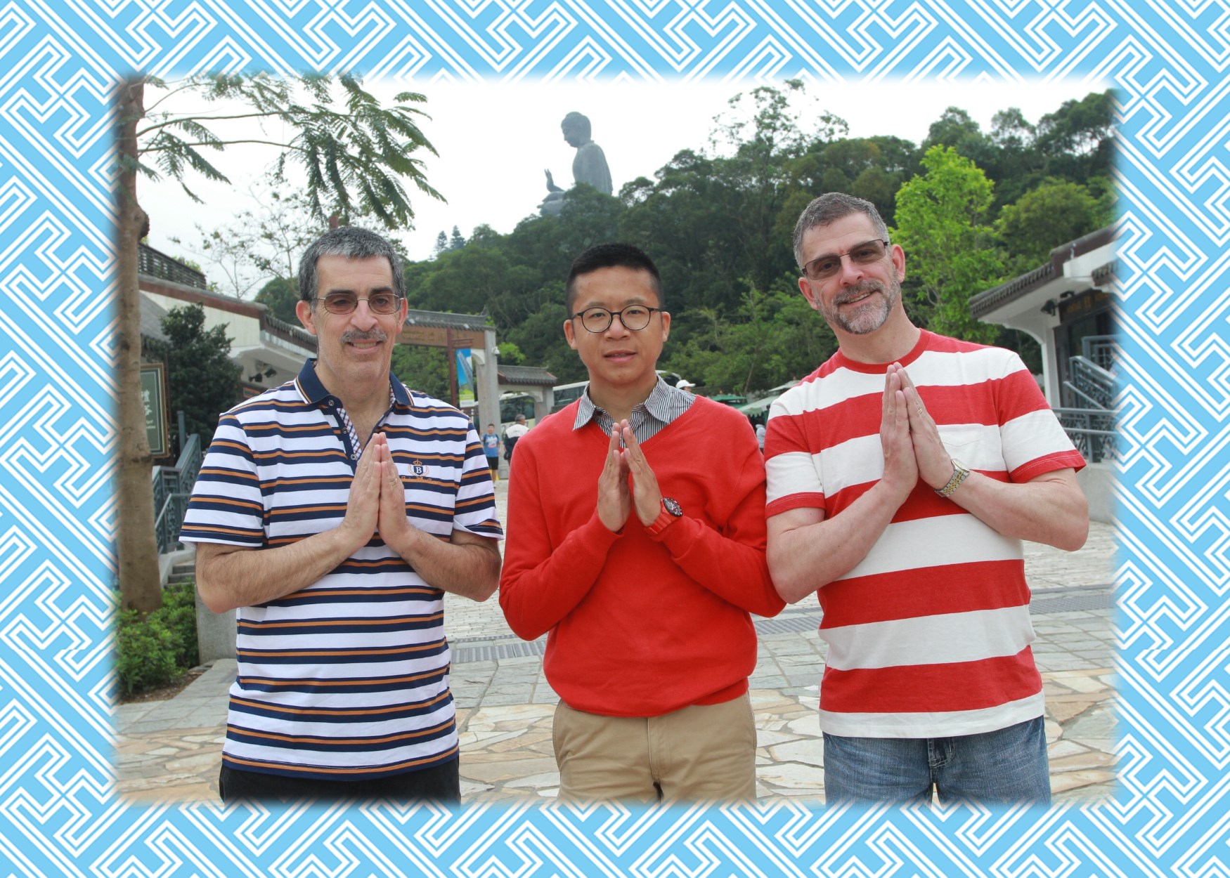 Frank the tour guide takes photo with Marvin Downs and friend near the Big Buddha