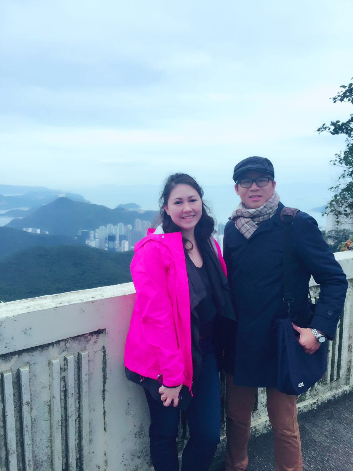 Frank the tour guide takes photo with Miss Galloway at Mount Kellett Road at Victoria Peak.