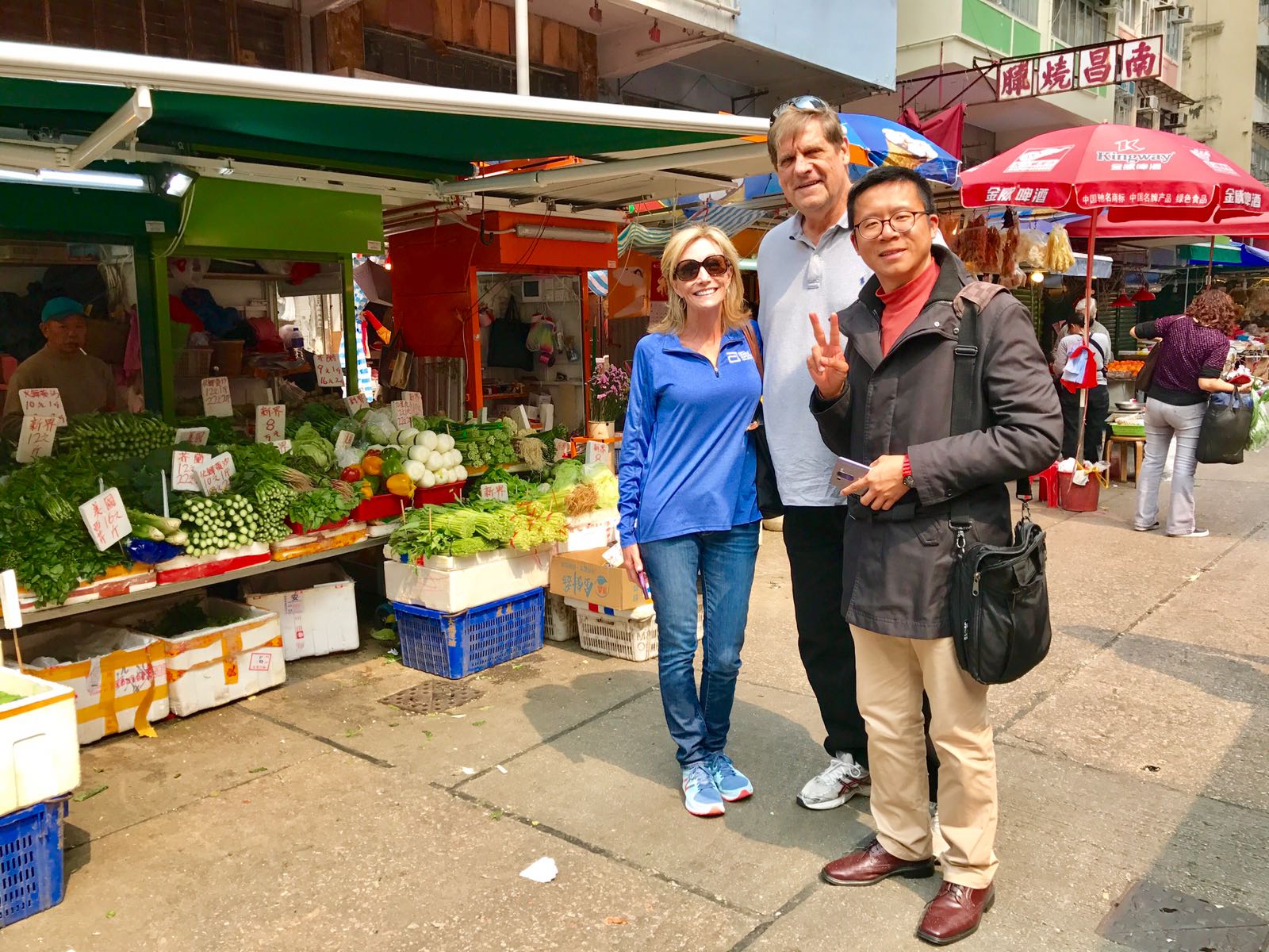 Frank the tour guide with Michael Clark and his wife at Shau Kei Wan Wet Market.