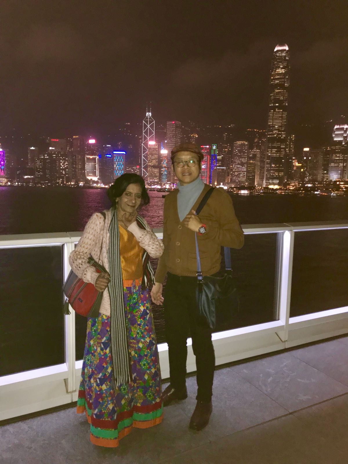 Mrs Rao, Frank the tour guide, Hong Kong skyline at night