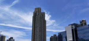 blue sky, cloud, contrail, tall buildings
