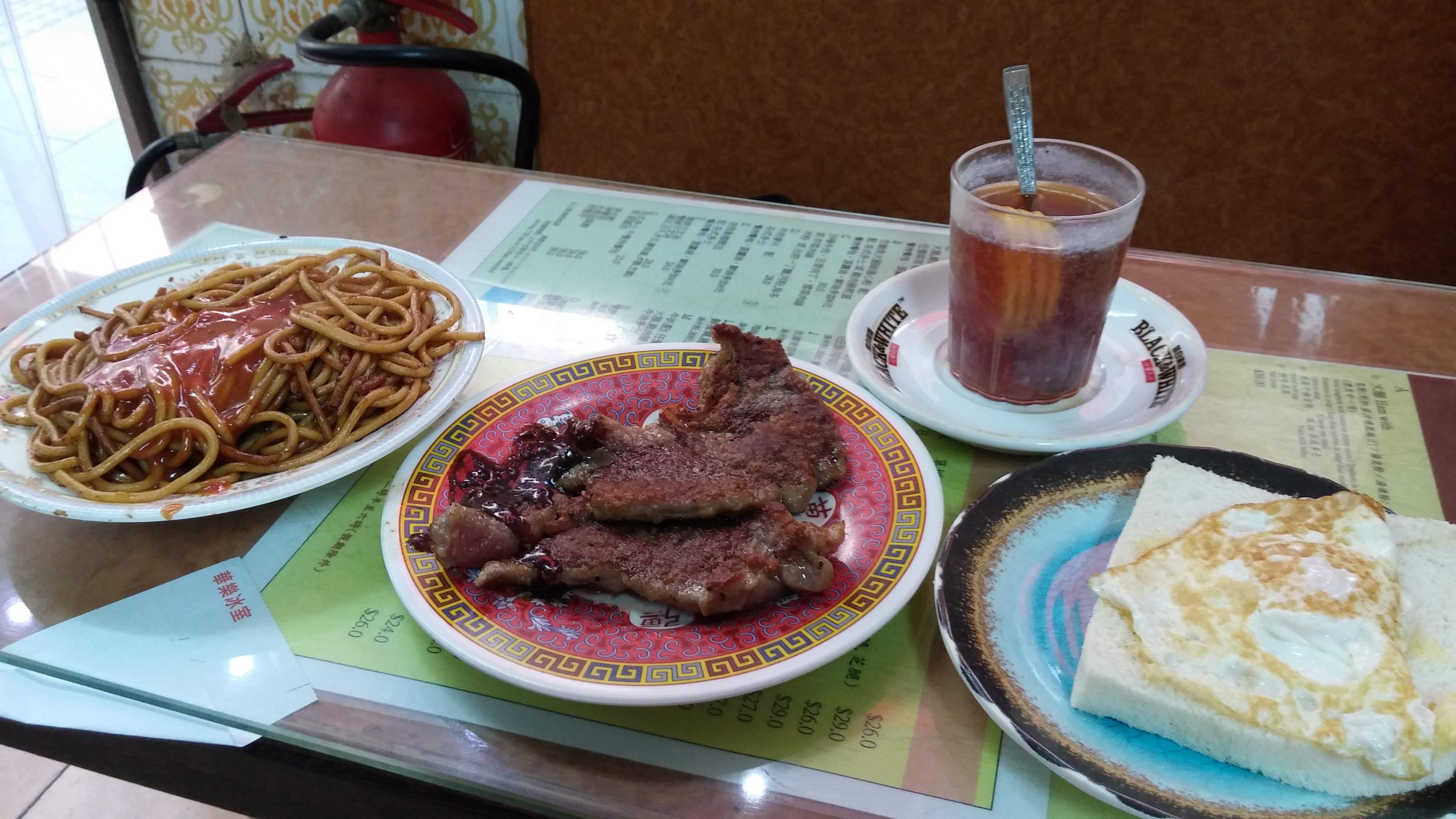 spaghetti, steak, lemon tea, bread with egg